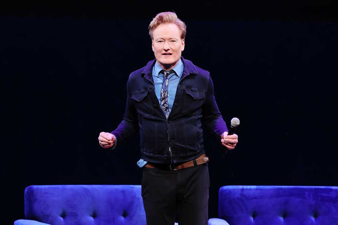 Conan O'Brien performs onstage during a live taping of Conan O'Brien Needs a Friend at the Brooklyn Academy of Music Conan O'Brien performs onstage during a live taping of Conan O'Brien Needs a Friend at the Brooklyn Academy of Music