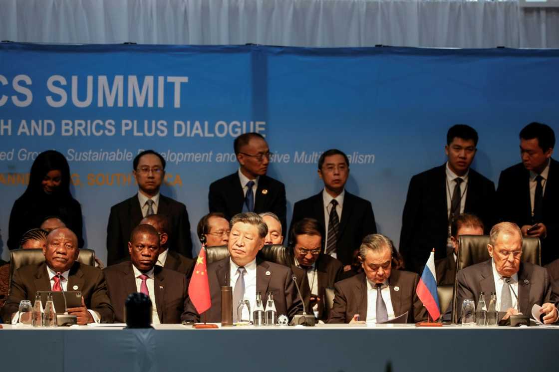 (1st row from L to R) South African President Cyril Ramaphosa, Deputy President of South Africa Paul Mashatile, President of China Xi Jinping, Chinese Foreign Minister Wang Yi and Russian Foreign Minister Sergei Lavrov at the summit (1st row from L to R) South African President Cyril Ramaphosa, Deputy President of South Africa Paul Mashatile, President of China Xi Jinping, Chinese Foreign Minister Wang Yi and Russian Foreign Minister Sergei Lavrov at the summit