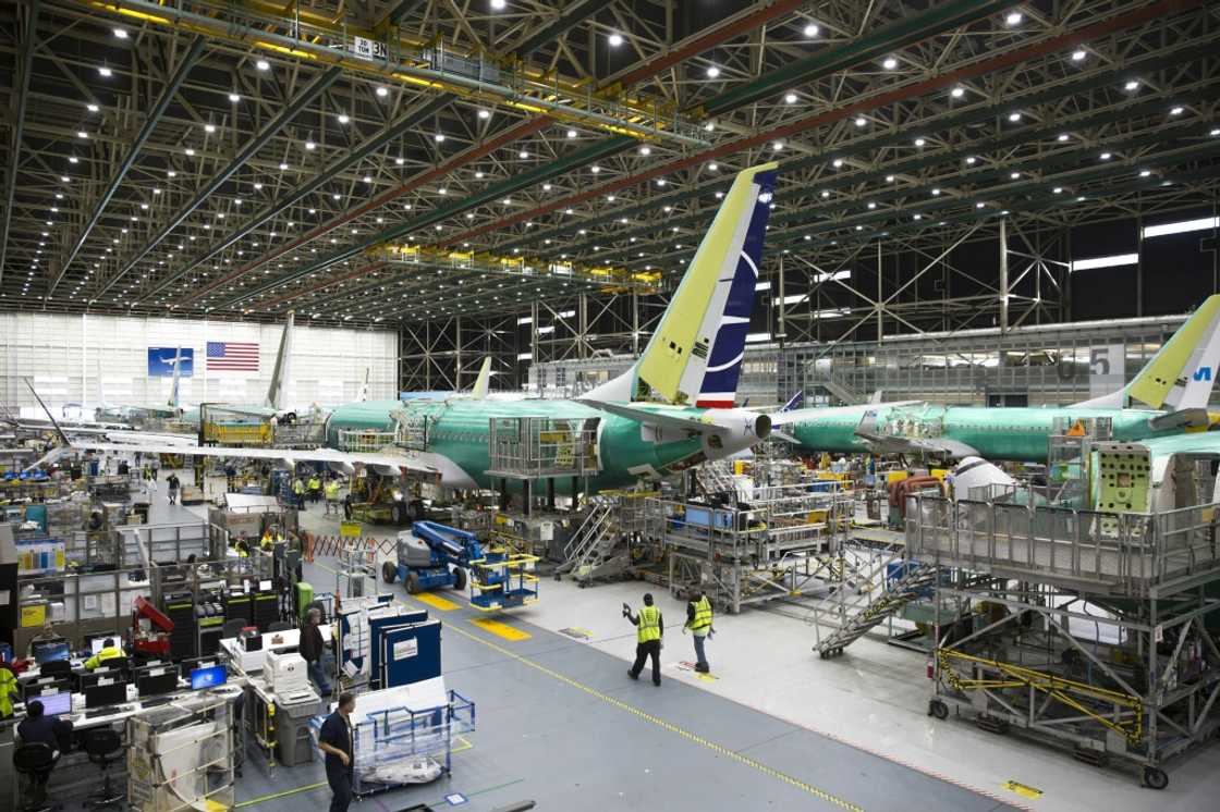 Employees work on Boeing 737 MAX airplanes at the Boeing Renton Factory in Renton, Washington on March 27, 2019 Employees work on Boeing 737 MAX airplanes at the Boeing Renton Factory in Renton, Washington on March 27, 2019