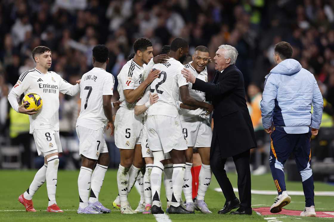 Kylian Mbappe of Real Madrid celebrates with his teammates after scoring his team's third goal during the La Liga match between Real Madrid CF and CD Leganés at Estadio Santiago Bernabeu on March 29, 2025 in Madrid, Spain Kylian Mbappe of Real Madrid celebrates with his teammates after scoring his team's third goal during the La Liga match between Real Madrid CF and CD Leganés at Estadio Santiago Bernabeu on March 29, 2025 in Madrid, Spain