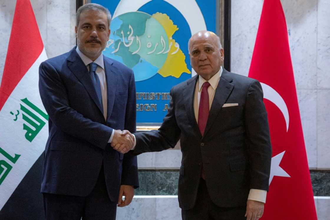 Turkish Foreign Minister Hakan Fidan (L) holds talks with his Iraqi counterpart Fuad Hussein ahead of an expected visit to Baghdad by Turkish President Recep Tayyip Erdogan Turkish Foreign Minister Hakan Fidan (L) holds talks with his Iraqi counterpart Fuad Hussein ahead of an expected visit to Baghdad by Turkish President Recep Tayyip Erdogan