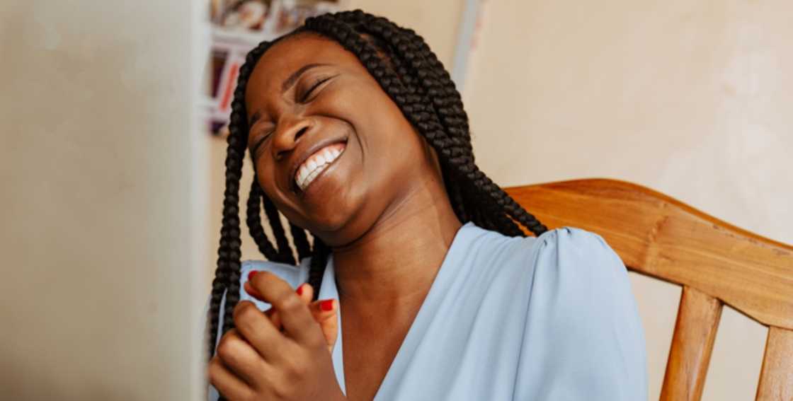 Ghanaian lady laughing Ghanaian lady laughing