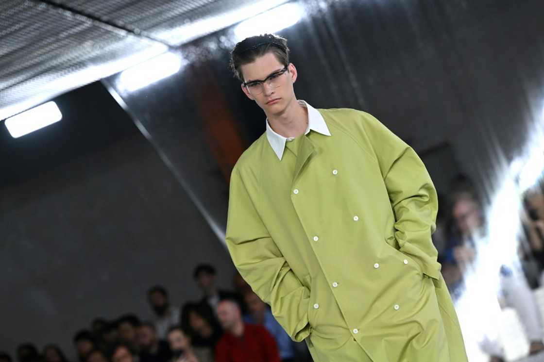 The Prada silhouette was streamlined, the cuts supple and the fabrics fluid, in cotton, denim or leather The Prada silhouette was streamlined, the cuts supple and the fabrics fluid, in cotton, denim or leather