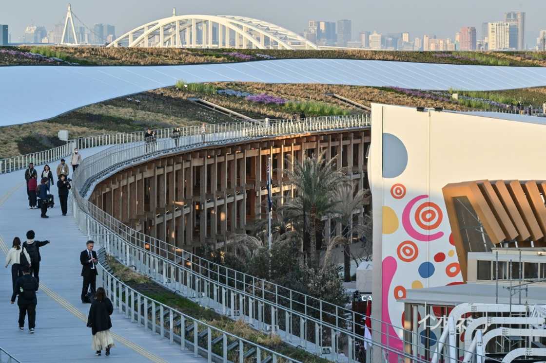 Visitors walk around the "Grand Ring" to look at various pavilions during a media preview day for the 2025 Osaka Expo Visitors walk around the "Grand Ring" to look at various pavilions during a media preview day for the 2025 Osaka Expo