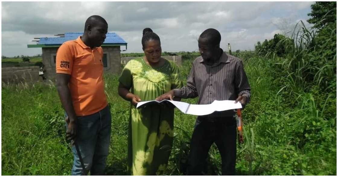 People inspecting a plot of land People inspecting a plot of land