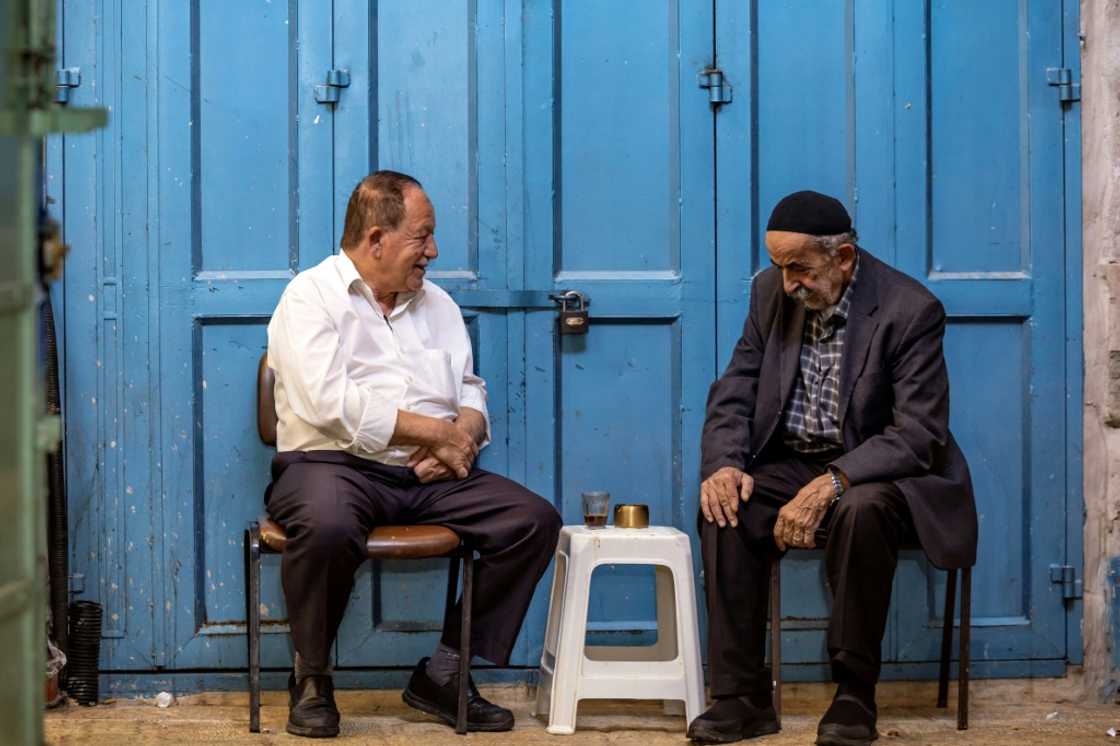 Without tourist spending, the Old City's shopkeepers are struggling economically. Without tourist spending, the Old City's shopkeepers are struggling economically.