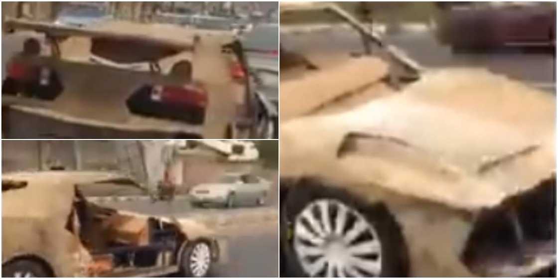 Nigerian man constructs sport car with condemned iron and carton, cruise around town with it Nigerian man constructs sport car with condemned iron and carton, cruise around town with it