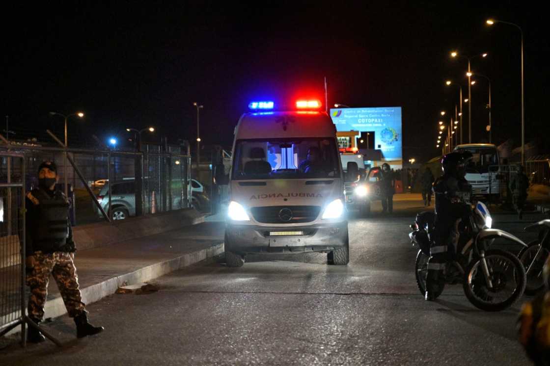 An ambulance leaves the prison, where repeated outbreaks of deadly violence linked to drug trafficking have occurred An ambulance leaves the prison, where repeated outbreaks of deadly violence linked to drug trafficking have occurred