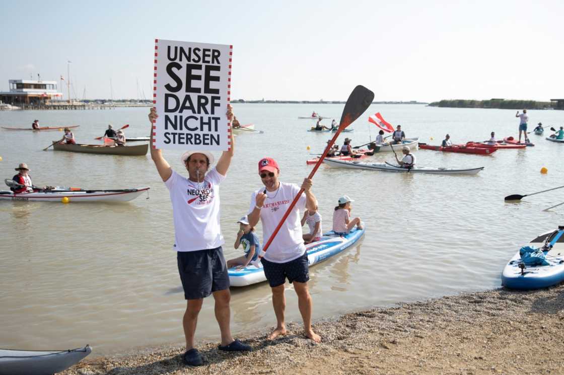 Last month over 100 people staged a rally to sound the alarm, some holding posters reading, 'Our lake must not die.'