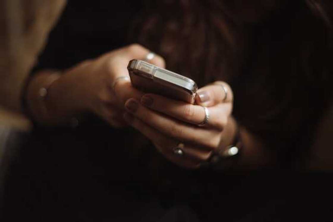 A woman using an app on the phone