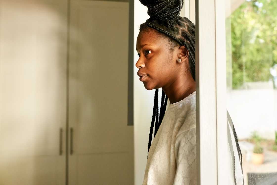 A girl entering the house