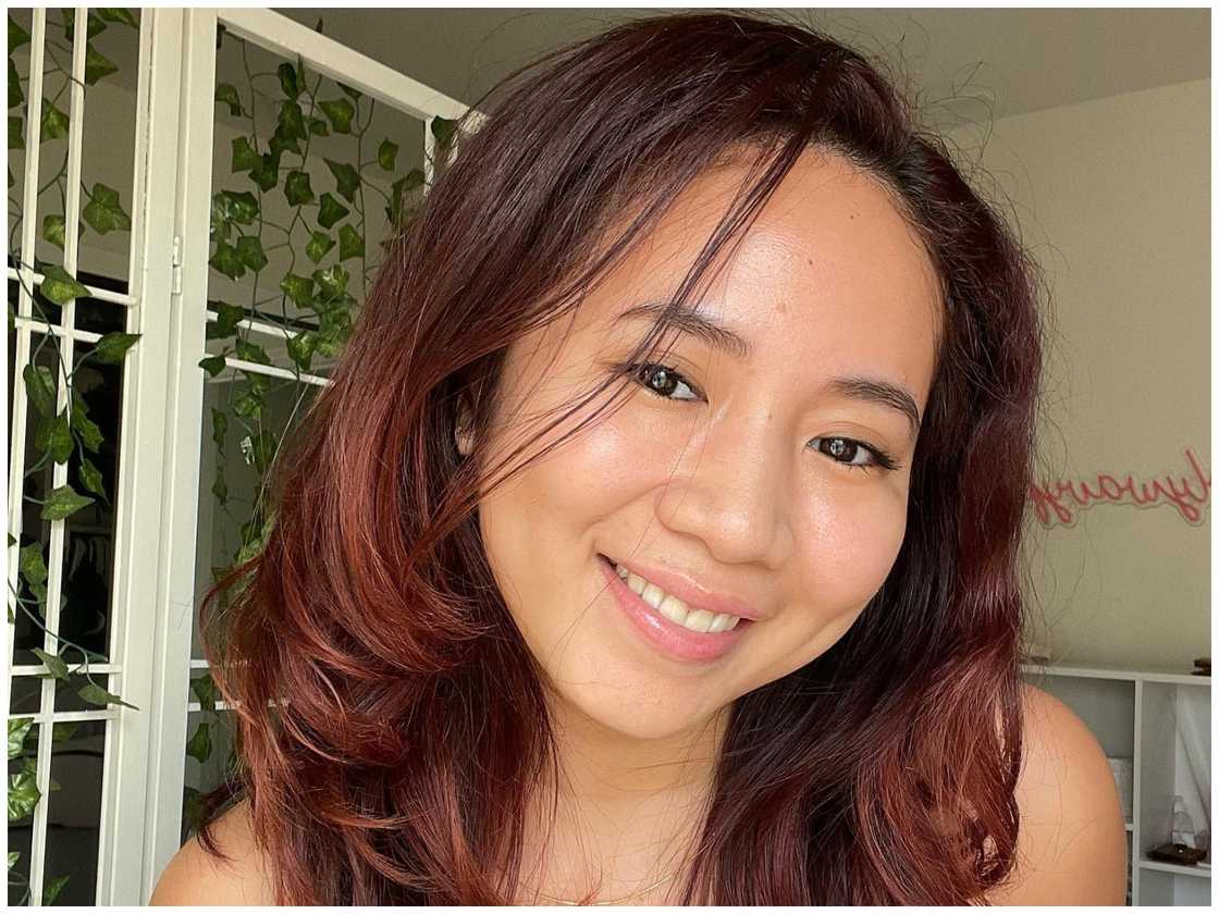 Mid-length burgundy red hair Mid-length burgundy red hair