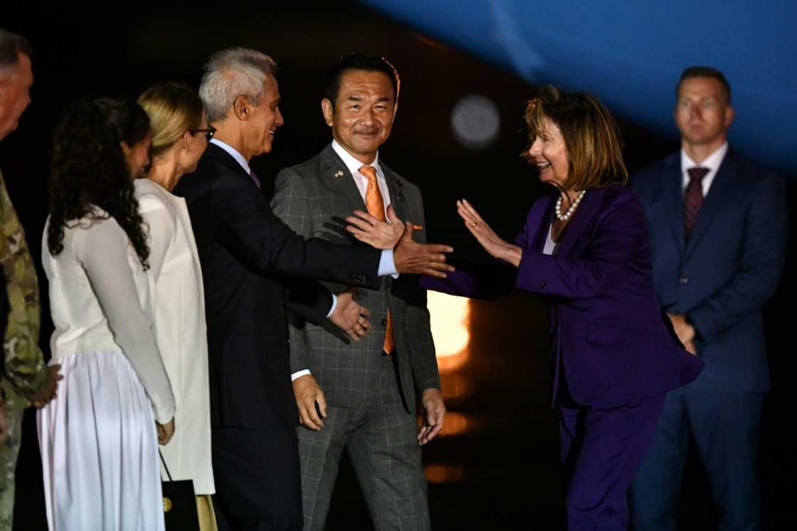 AFP reporters saw the politician disembark from her plane at Yokota Air Base in Tokyo, before greeting the US ambassador and other officials with hugs and handshakes