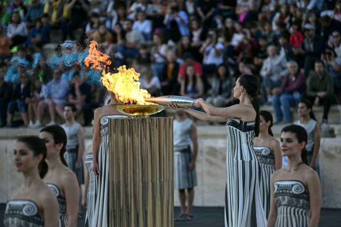 The Olympic flame was handed to Paris organisers last Friday during a ceremony in Greece