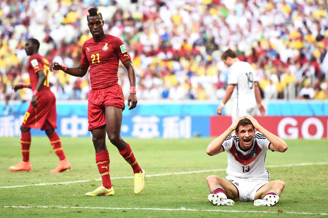 John Boye, Thomas Muller, World Cup 2014 John Boye, Thomas Muller, World Cup 2014