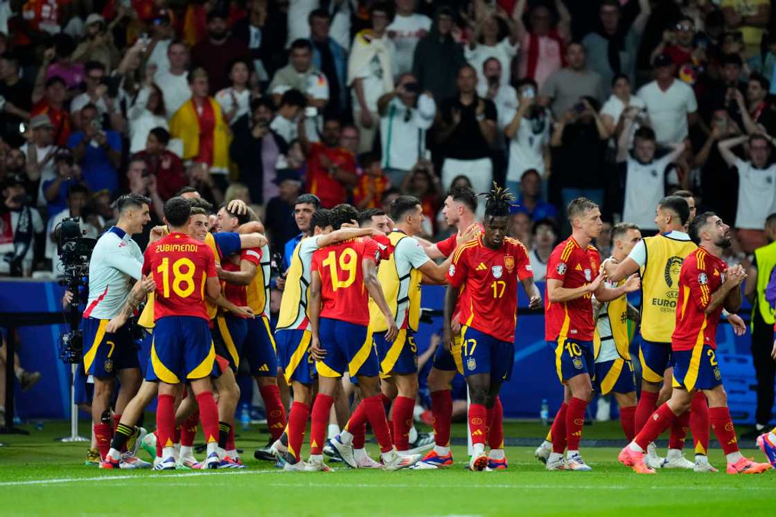 Spain players celebrating Mikel Oyarzabal's winner at Euro 2024 Spain players celebrating Mikel Oyarzabal's winner at Euro 2024