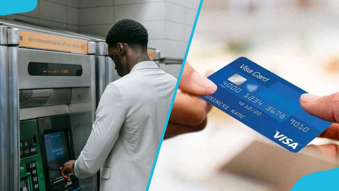 Someone using a VISA card in an ATM Someone using a VISA card in an ATM