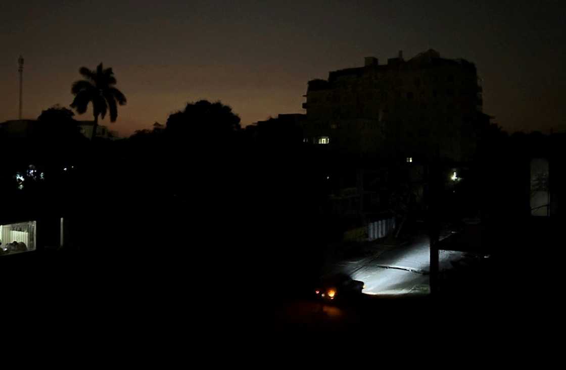 Car lights illuminate a street in Havana, Cuba during a widespread electricty blackout that hit much of the island nation Car lights illuminate a street in Havana, Cuba during a widespread electricty blackout that hit much of the island nation