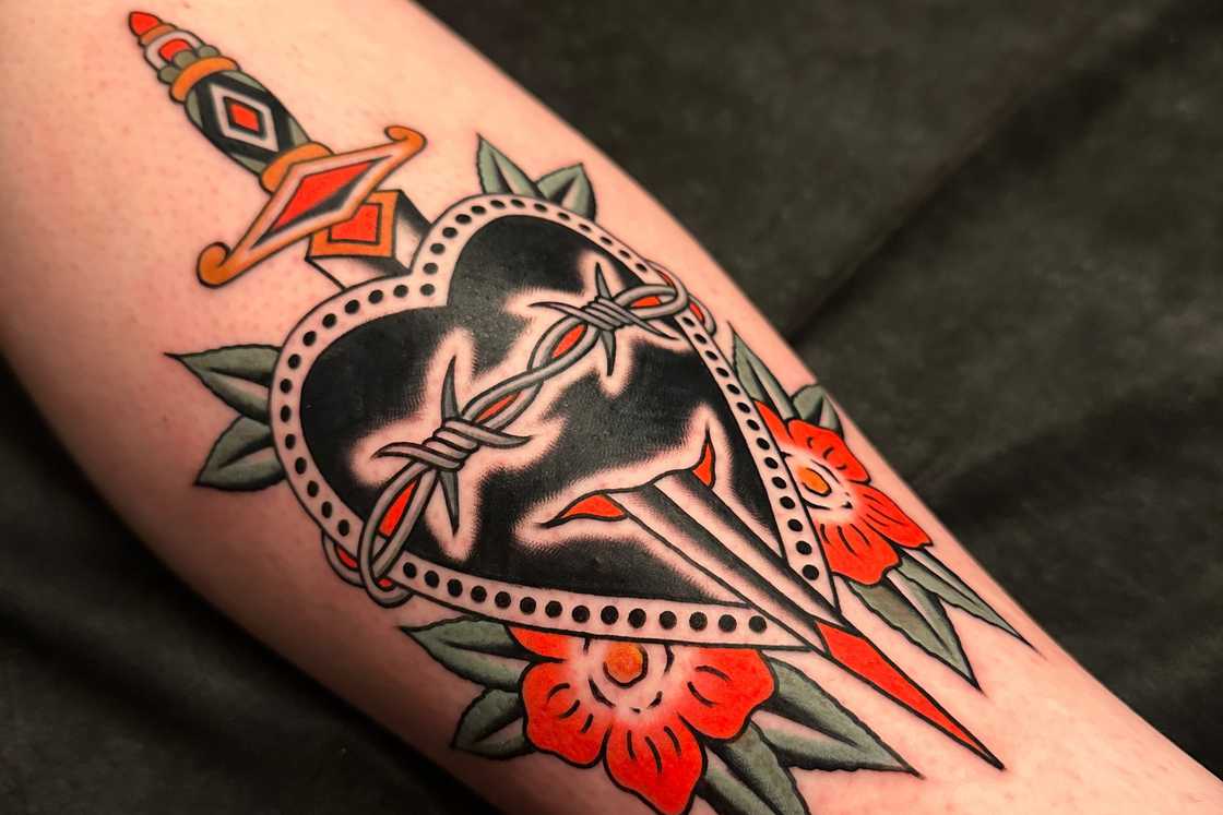 A traditional dagger through a heart A traditional dagger through a heart