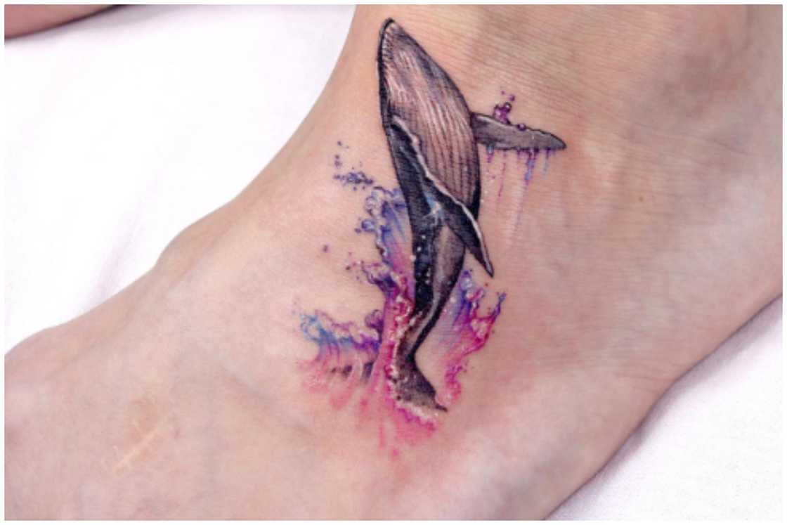 Watercolour whale tattoo