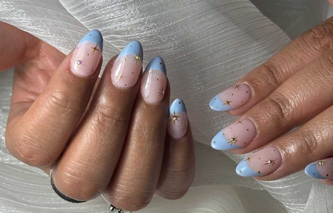 Almond milky nails with a celestial touch