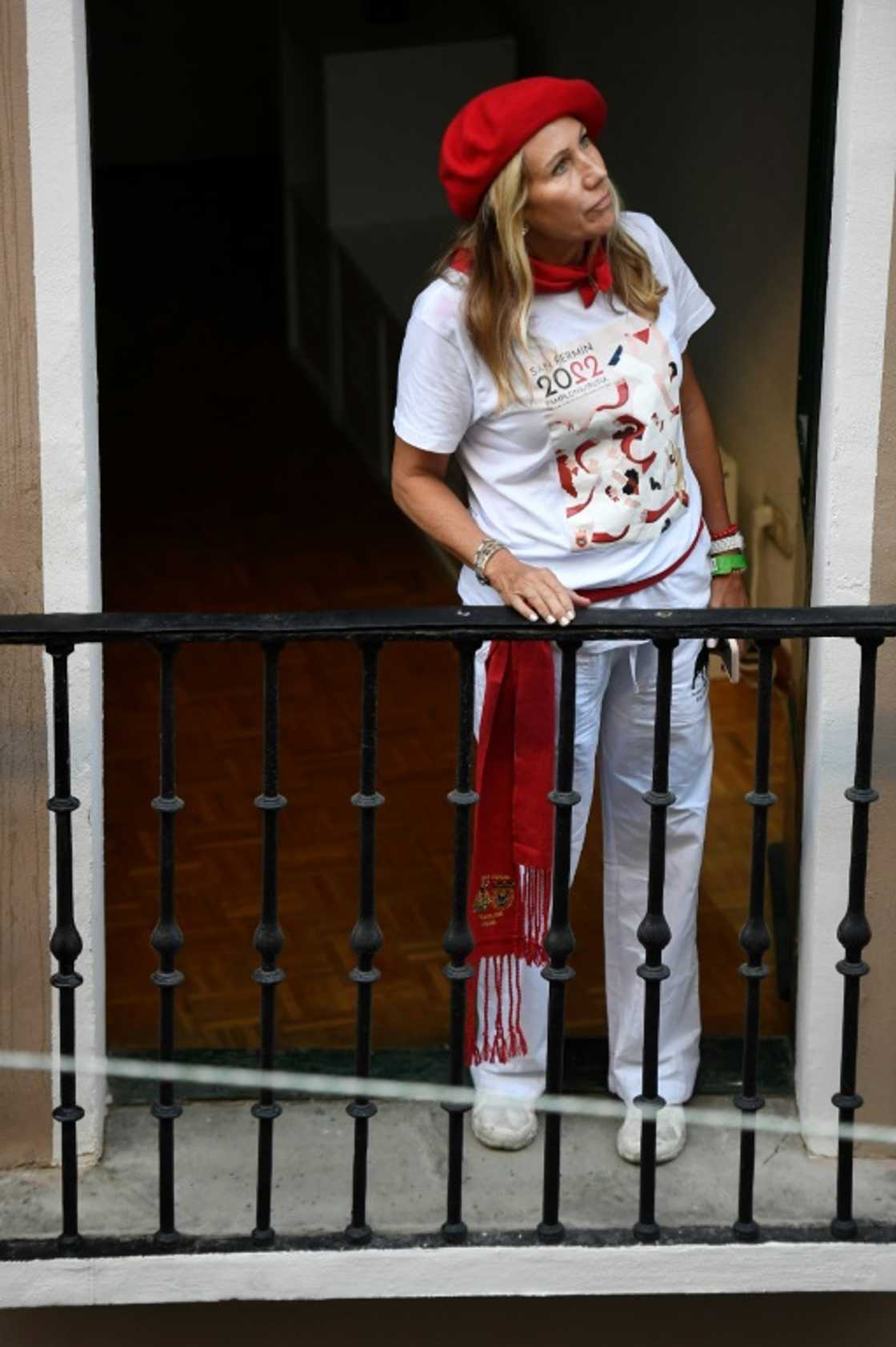 The vast majority of participants are men, but some women cheered on from balconies The vast majority of participants are men, but some women cheered on from balconies