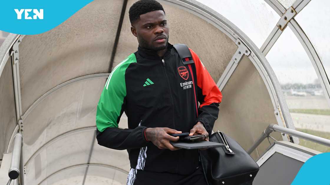 Thomas Partey of Arsenal travels to Madrid ahead of their UEFA Champions League 2024/25 quarter final second leg match at Luton Airport on April 15, 2025 in Luton, England. Thomas Partey of Arsenal travels to Madrid ahead of their UEFA Champions League 2024/25 quarter final second leg match at Luton Airport on April 15, 2025 in Luton, England.