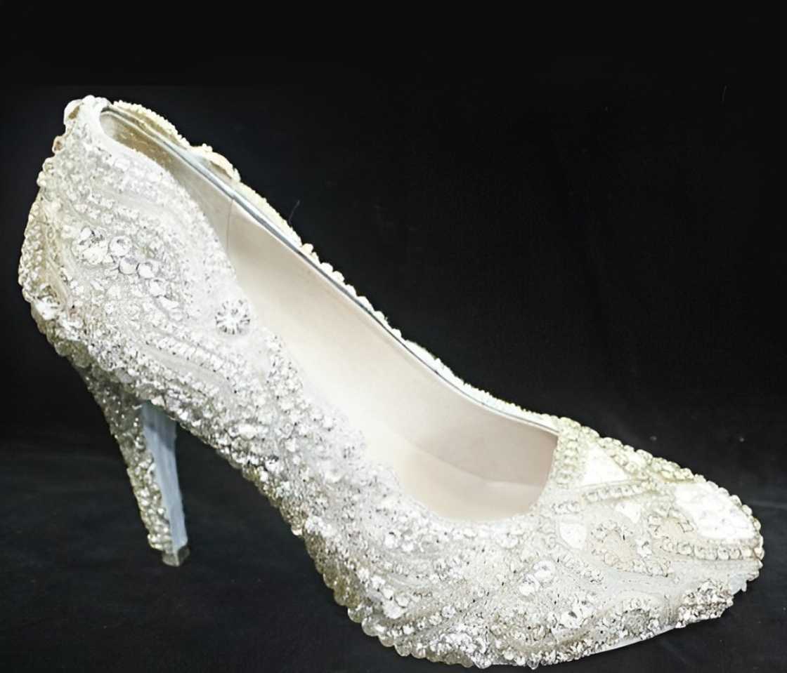 Kathryn Wilson Diamond shoe is on a dark background