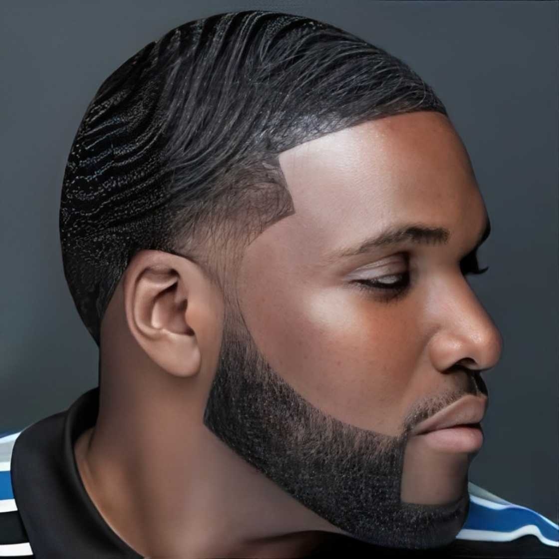 An African man is rocking a low fade beard style An African man is rocking a low fade beard style