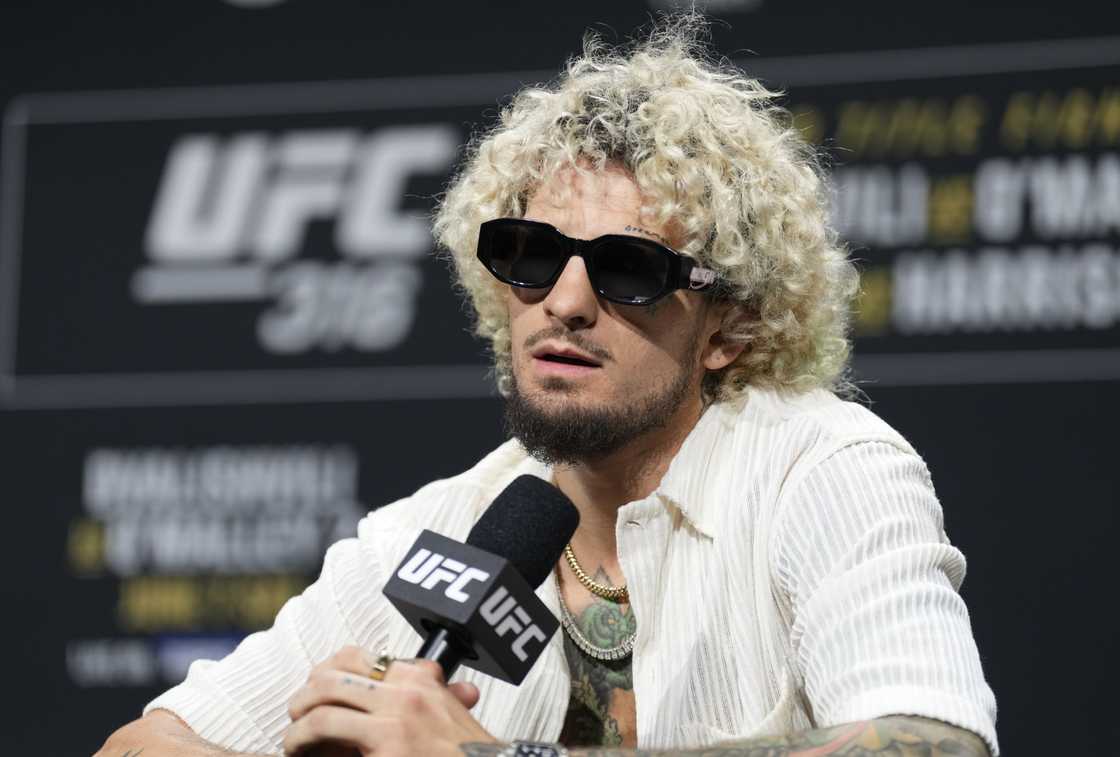 Sean O'Malley is seen on stage during the UFC 316 press conference Sean O'Malley is seen on stage during the UFC 316 press conference