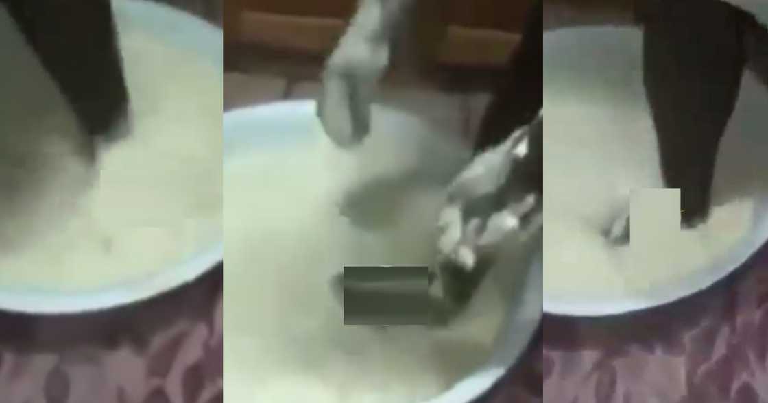 Bofrot seller captured on camera mashing flour with her dirty feet; internet reacts Bofrot seller captured on camera mashing flour with her dirty feet; internet reacts