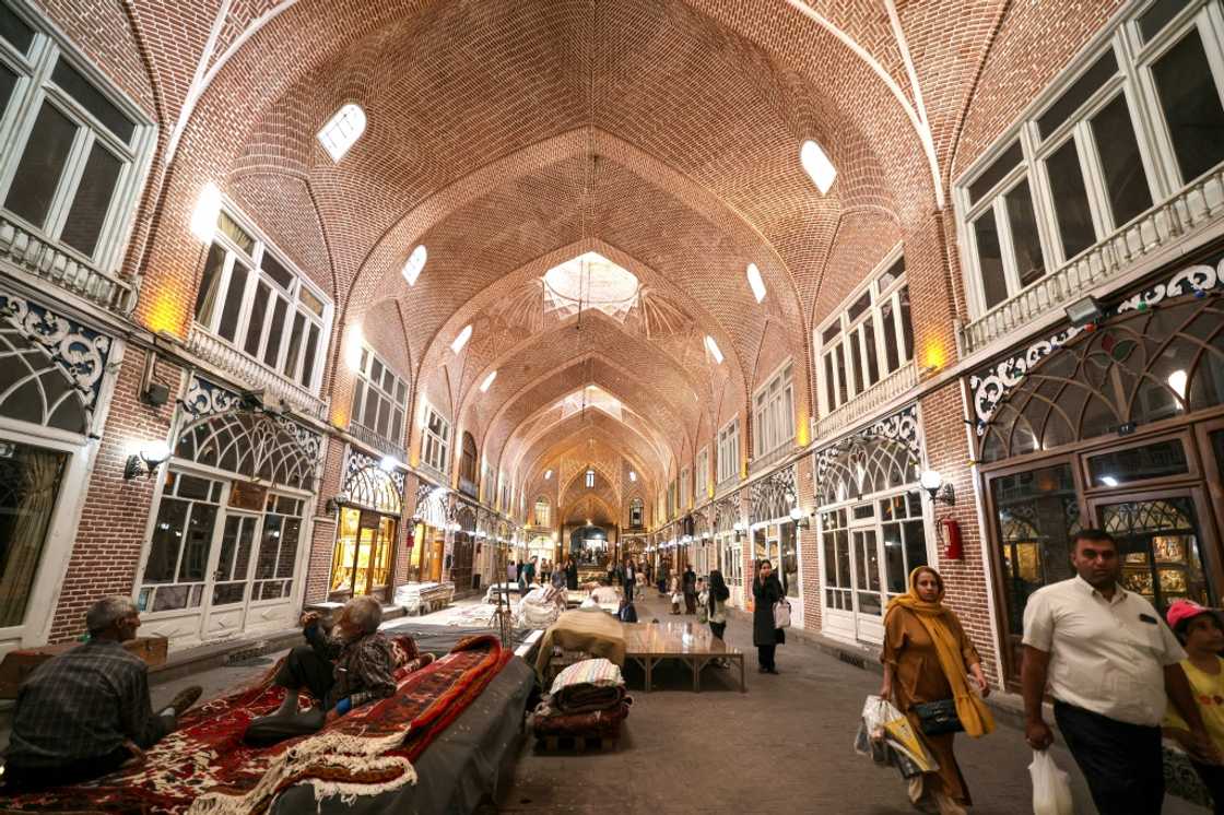 For decades, tourists would pass through Iran, picking up rugs, but with the industry hit by travel warnings and hostile relations, fewer foreigners are visiting, translating to fewer rug sales For decades, tourists would pass through Iran, picking up rugs, but with the industry hit by travel warnings and hostile relations, fewer foreigners are visiting, translating to fewer rug sales