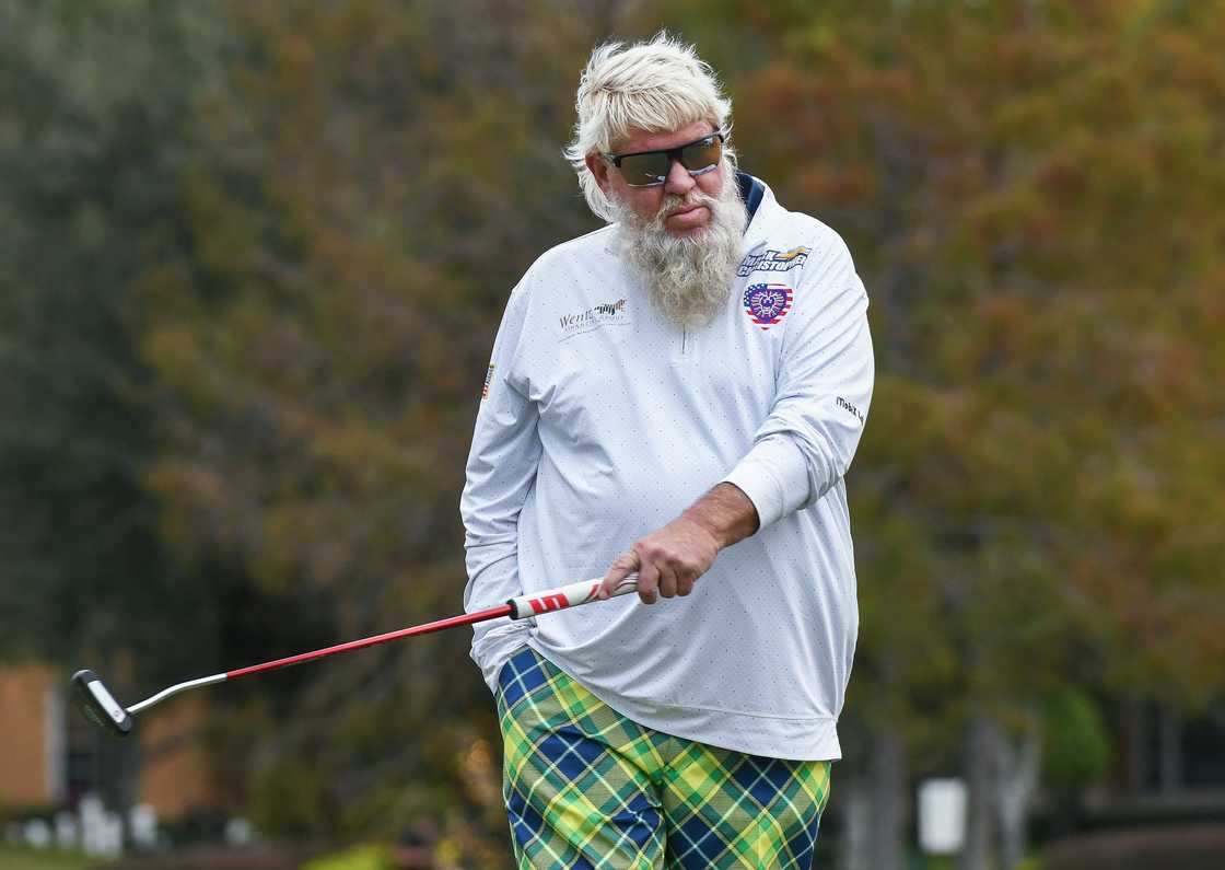 John Daly reacts during the final round of the PNC Championship. John Daly reacts during the final round of the PNC Championship.