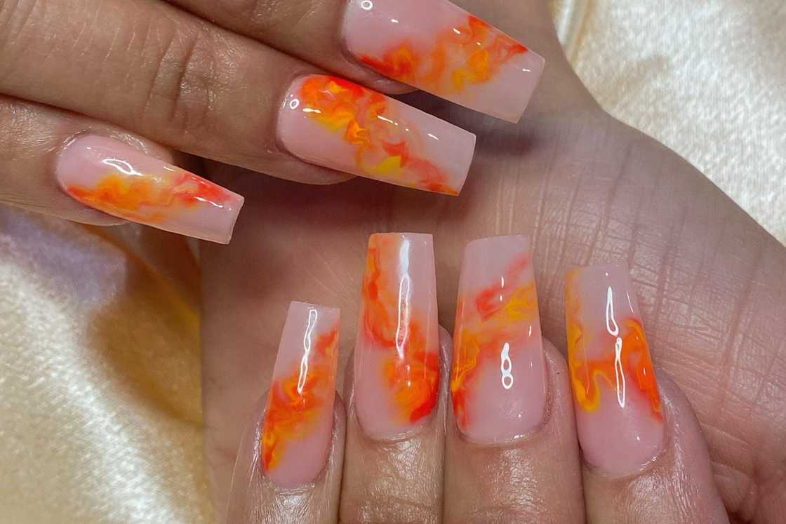 Orange marble nails Orange marble nails