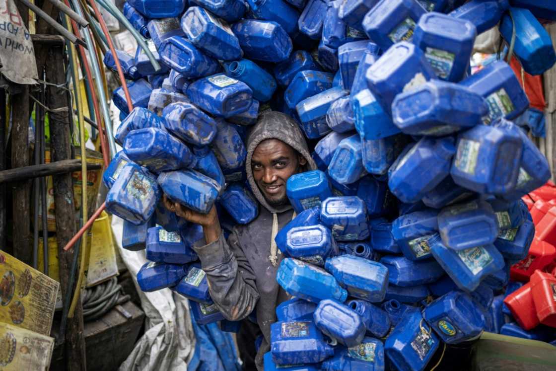 Ezedin Muste, 23, is one of thousands of waste collectors known in Amharic as 'korale' Ezedin Muste, 23, is one of thousands of waste collectors known in Amharic as 'korale'