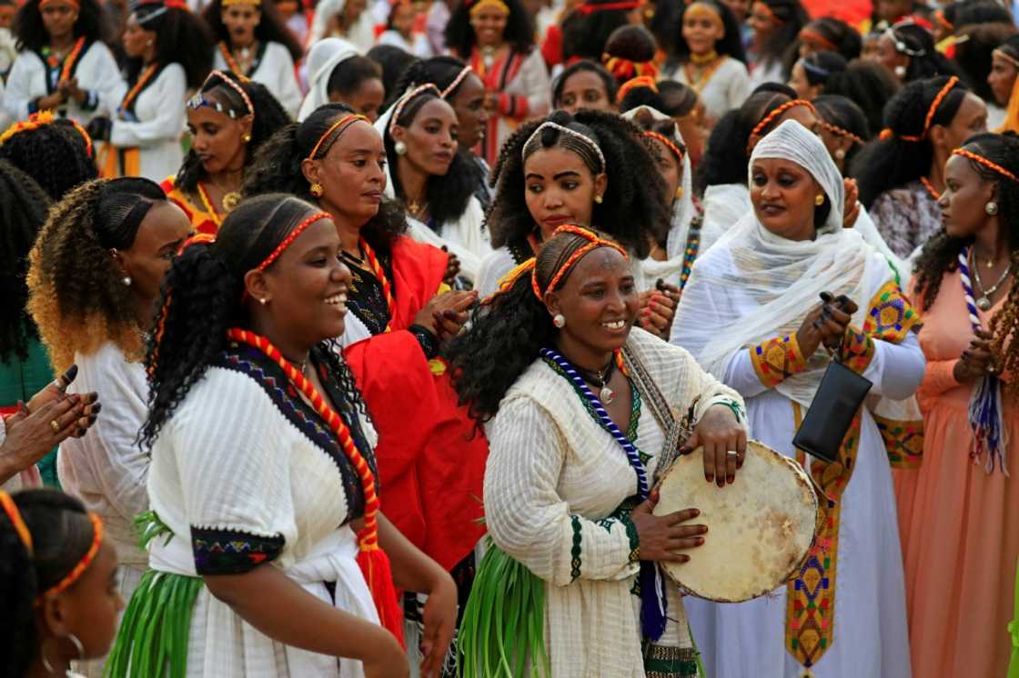 As part of the festivities, women wear skirts made of weaved Ashenda grass over white cotton dresses with colourful embroidery As part of the festivities, women wear skirts made of weaved Ashenda grass over white cotton dresses with colourful embroidery