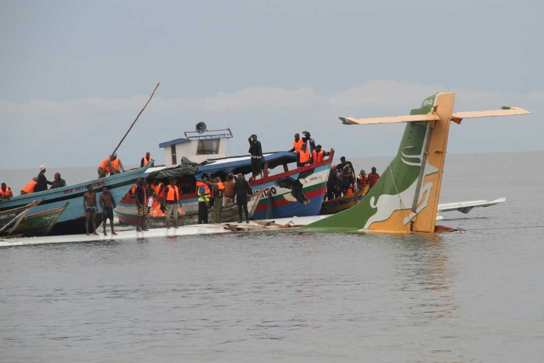 Rescuers searched for survivors after the Precision Air flight plunged into Lake Victoria with 43 people on board Rescuers searched for survivors after the Precision Air flight plunged into Lake Victoria with 43 people on board