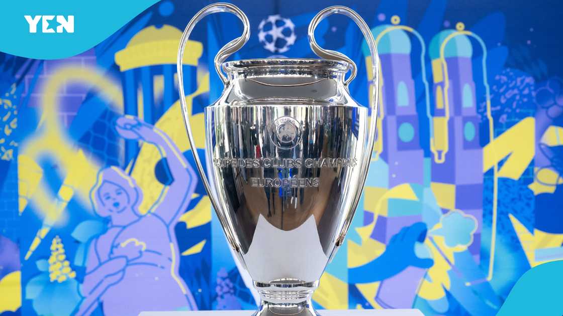 The trophy stands on a table during a press conference on the status of preparations for the Champions League final in Munich on May 31, 2025