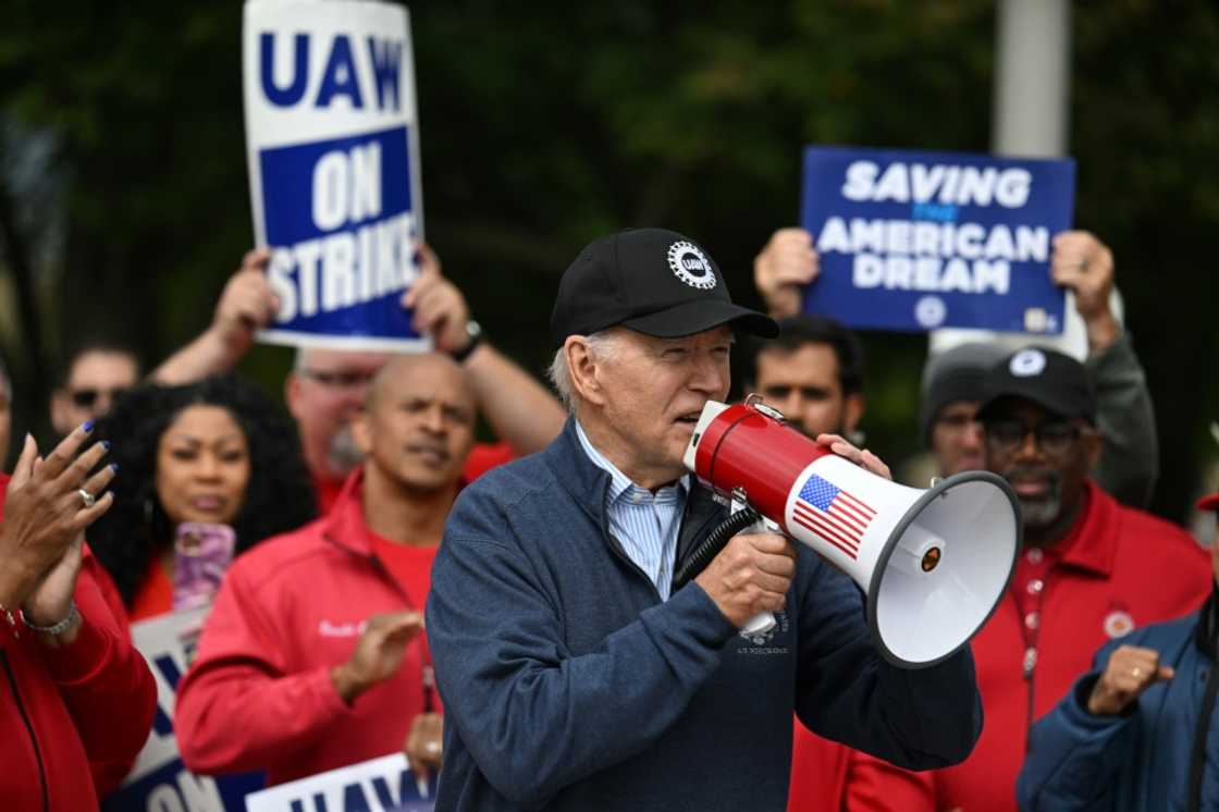 US President Joe Biden addressed striking members of the United Auto Workers (UAW) union at a picket line in Michigan in September US President Joe Biden addressed striking members of the United Auto Workers (UAW) union at a picket line in Michigan in September