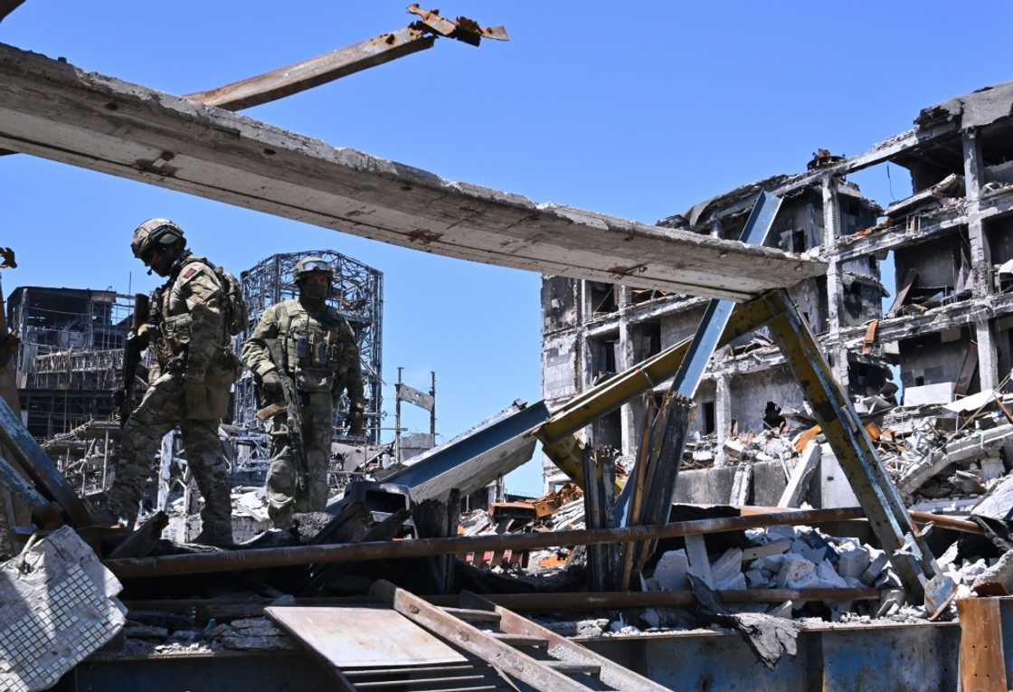 Russian servicemen in the ruins of the Azovstal steel plant in Mariupol. But weeks of Ukraine resistance prevented Russian forces from redeploying to the Donbas region Russian servicemen in the ruins of the Azovstal steel plant in Mariupol. But weeks of Ukraine resistance prevented Russian forces from redeploying to the Donbas region