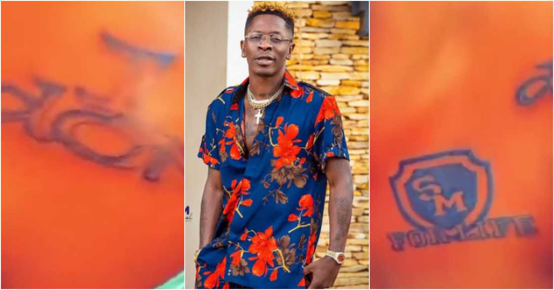 True love: Diehard fan tattoos 1 Don and For Life on her body to honour Shatta Wale in video