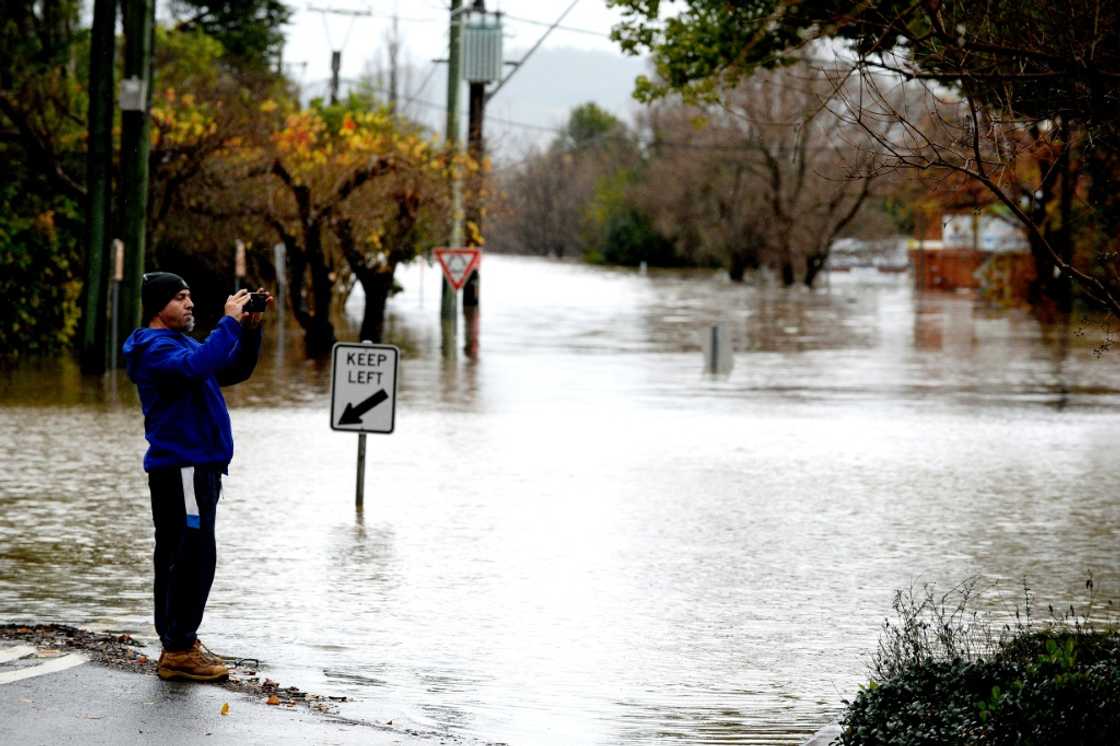 Roads disappeared into the waters and mobile homes stood in knee-high water Roads disappeared into the waters and mobile homes stood in knee-high water