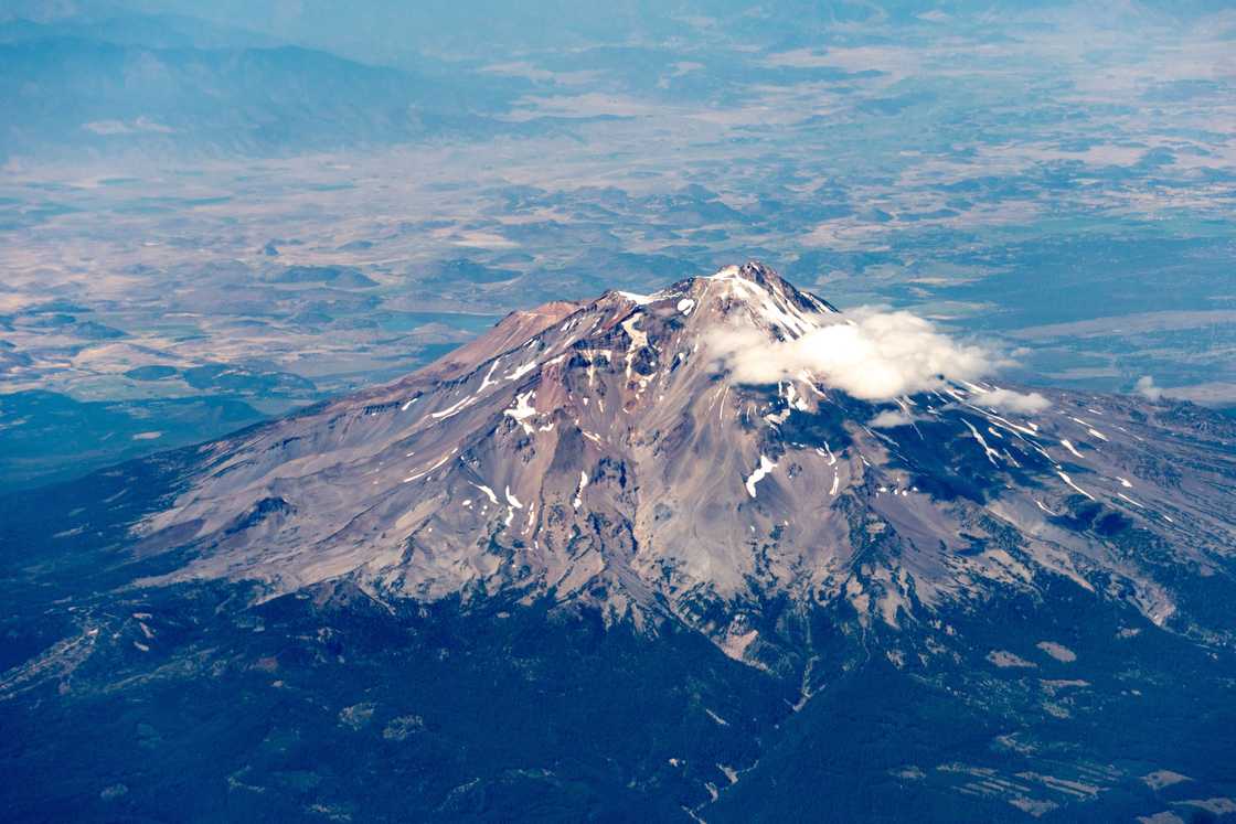 Aerial view of Mt. Shasta nearly devoid of snow.