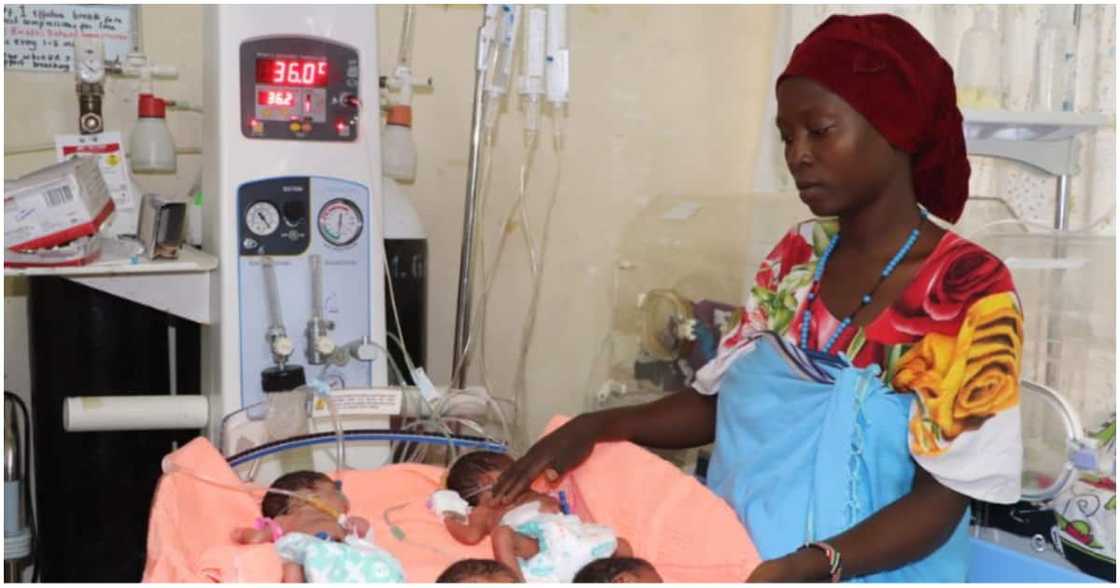 Kwale woman Christine Mulongo and her quadruplets. Kwale woman Christine Mulongo and her quadruplets.