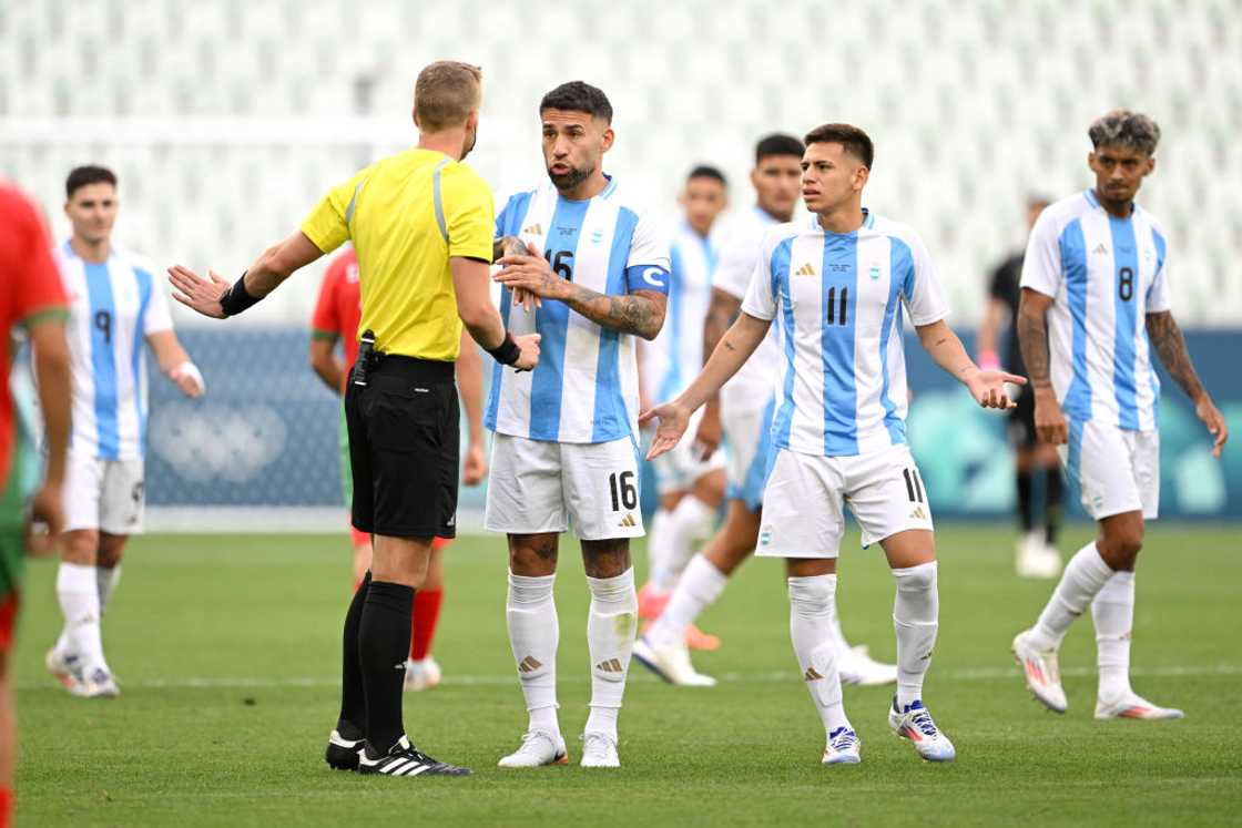 Nicolas Otamendi argues with the referee at Paris 2024