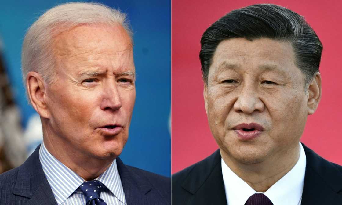 Chinese President Xi Jinping (R) warned American counterpart Joe Biden in a late July phone call that the United States shouldn't 'play with fire' over Taiwan Chinese President Xi Jinping (R) warned American counterpart Joe Biden in a late July phone call that the United States shouldn't 'play with fire' over Taiwan