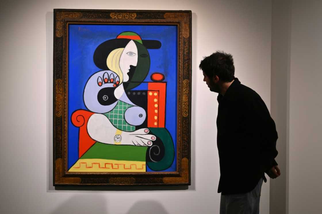 Pablo Picasso's painting 'Femme a la montre,' or 'Woman with a Watch' is viewed during Sotheby’s fall preview in New York on November 2, 2023 Pablo Picasso's painting 'Femme a la montre,' or 'Woman with a Watch' is viewed during Sotheby’s fall preview in New York on November 2, 2023