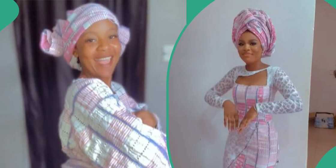 Lady excitedly transforms aso-oke outfit Lady excitedly transforms aso-oke outfit