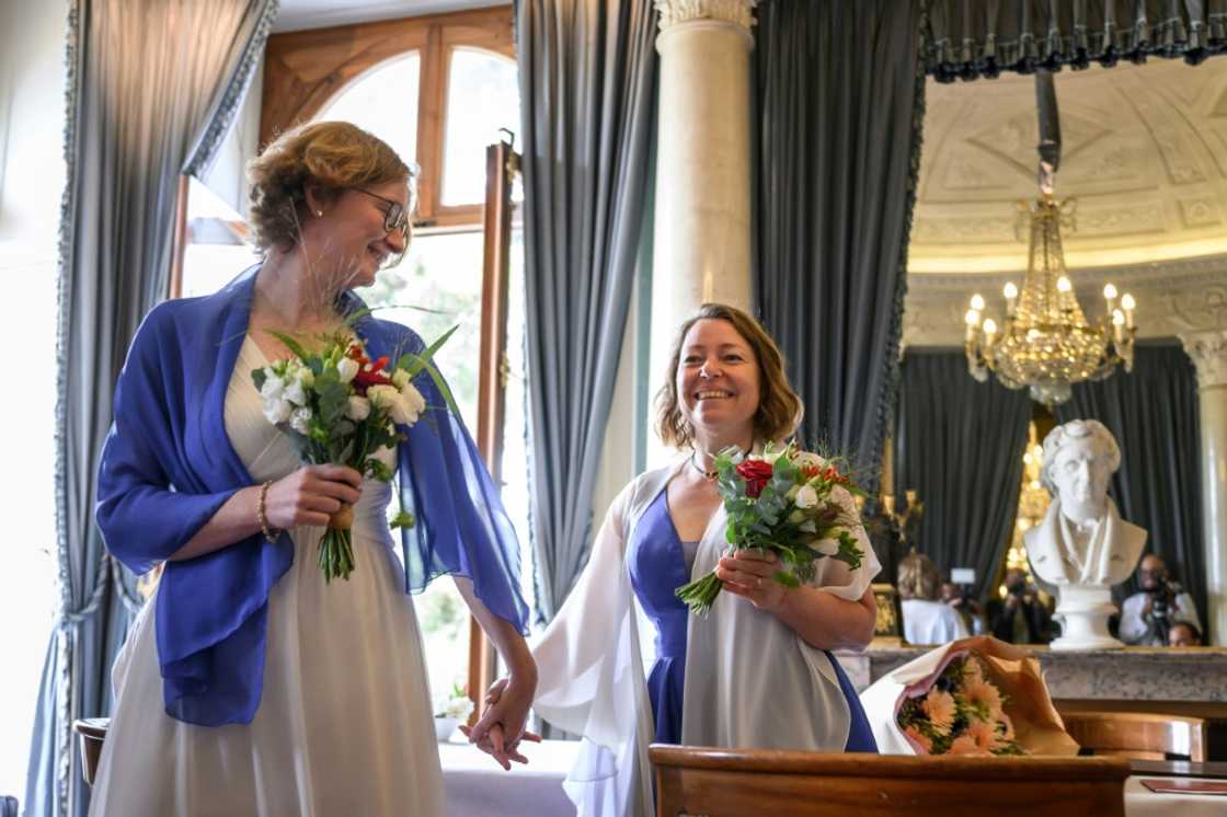 Aline, 46, and Laure, 45, converted their civil union into marriage at the plush Palais Eynard in Geneva Aline, 46, and Laure, 45, converted their civil union into marriage at the plush Palais Eynard in Geneva