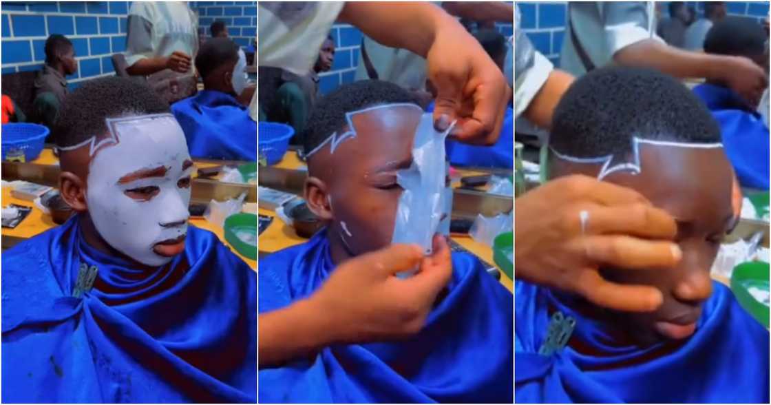 Photo of young kid at a barbering saloon